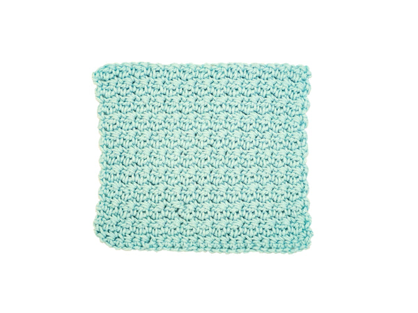 Handmade crocheted wash cloth in aqua