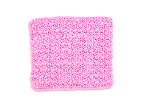 Handmade crocheted wash cloth in pink