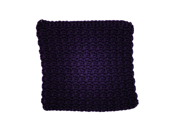 Handmade crocheted wash cloth in dark purple